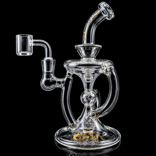 Clear glass water pipe with intricate design on a black background