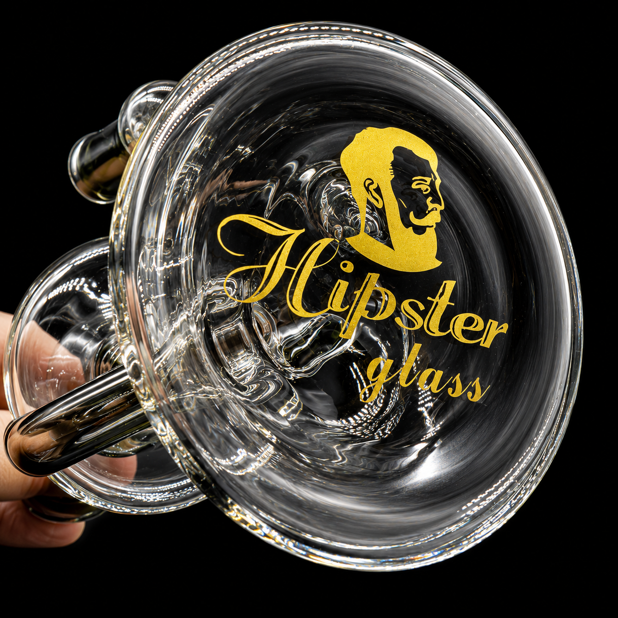 Clear glass mug with 'Hipster glass' text and logo on a black background