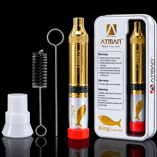 Gold glass blunt  pen with accessories and packaging on a black background