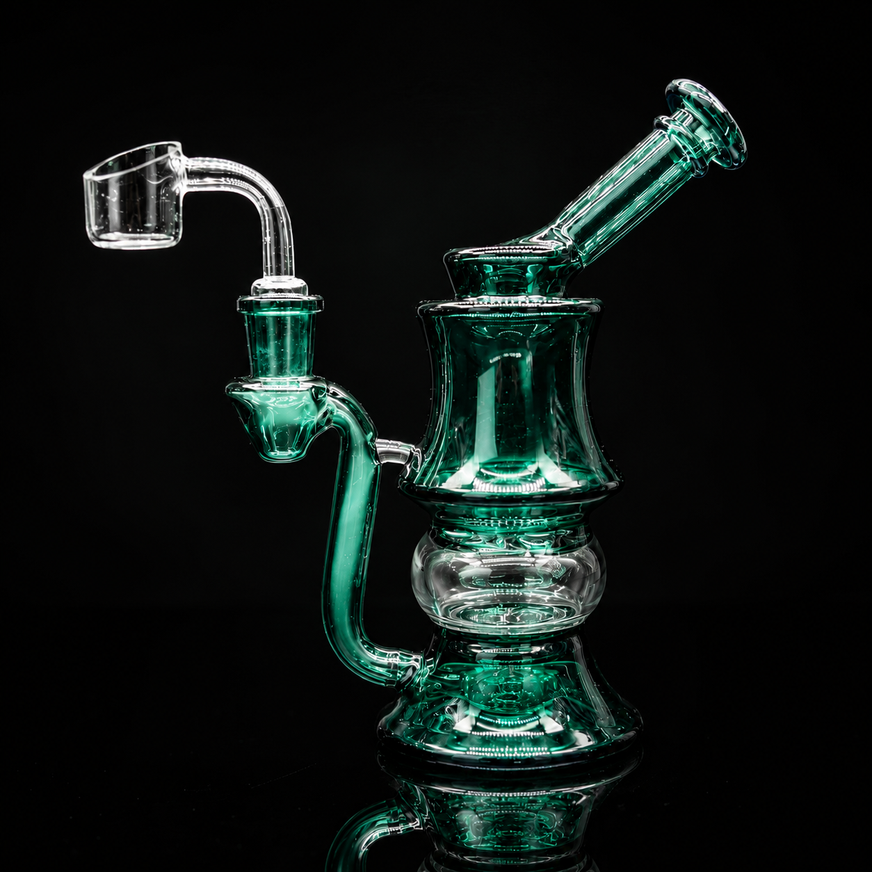 Green glass water pipe on a black background
