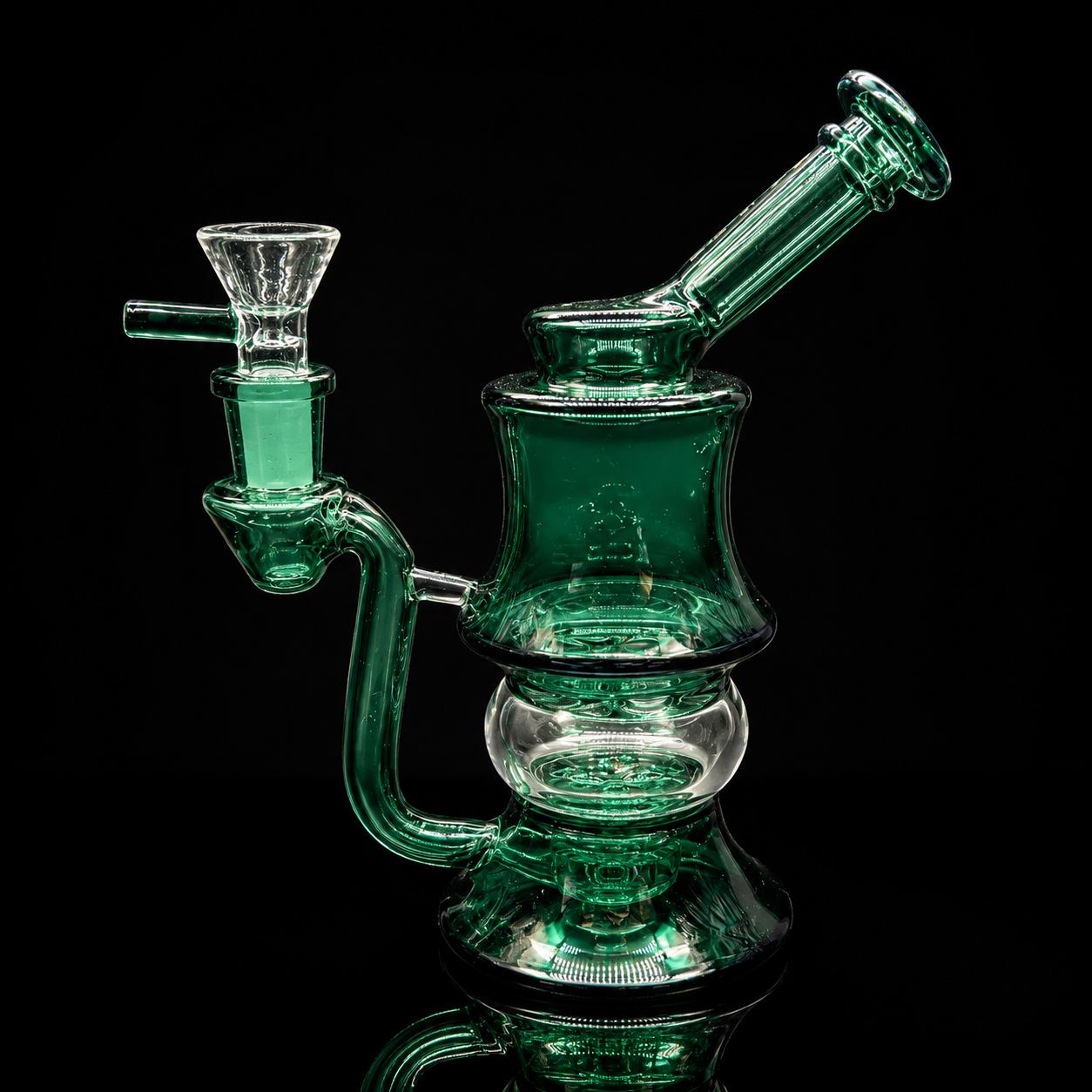 Green glass water pipe on a black background