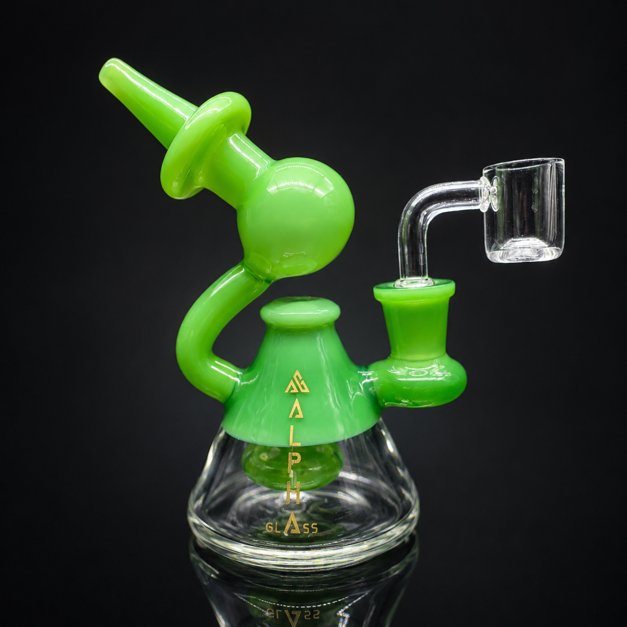 Glass smoking device with green accents on a black background
