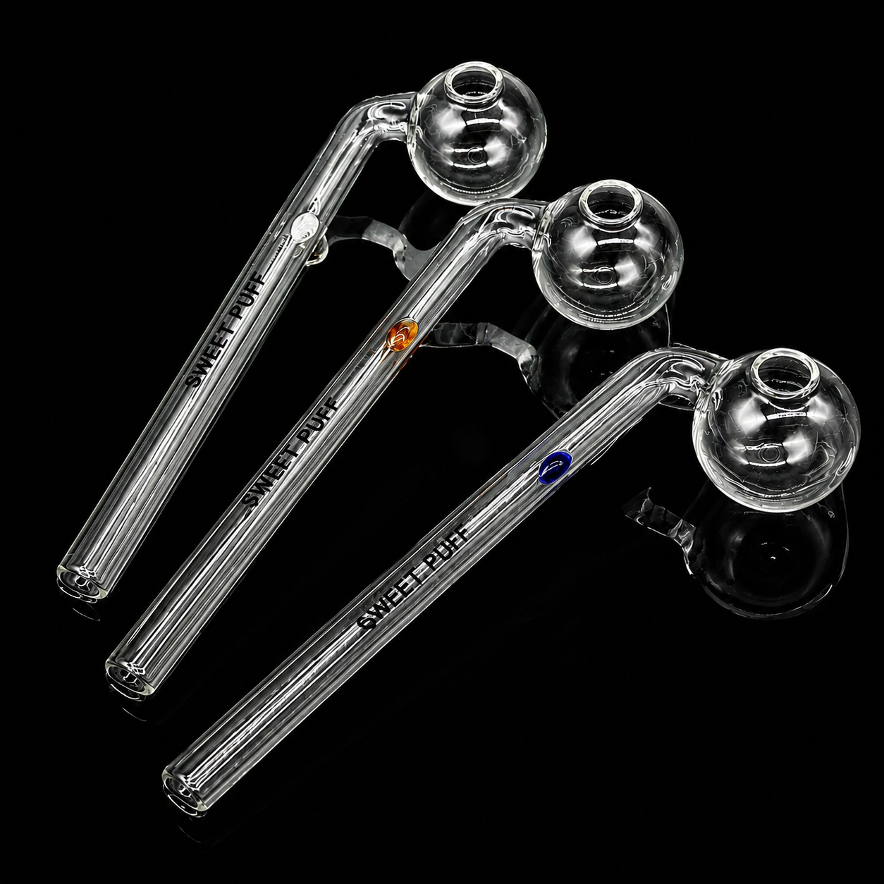 Three glass pipes with 'Sweet Puff' branding on a black background