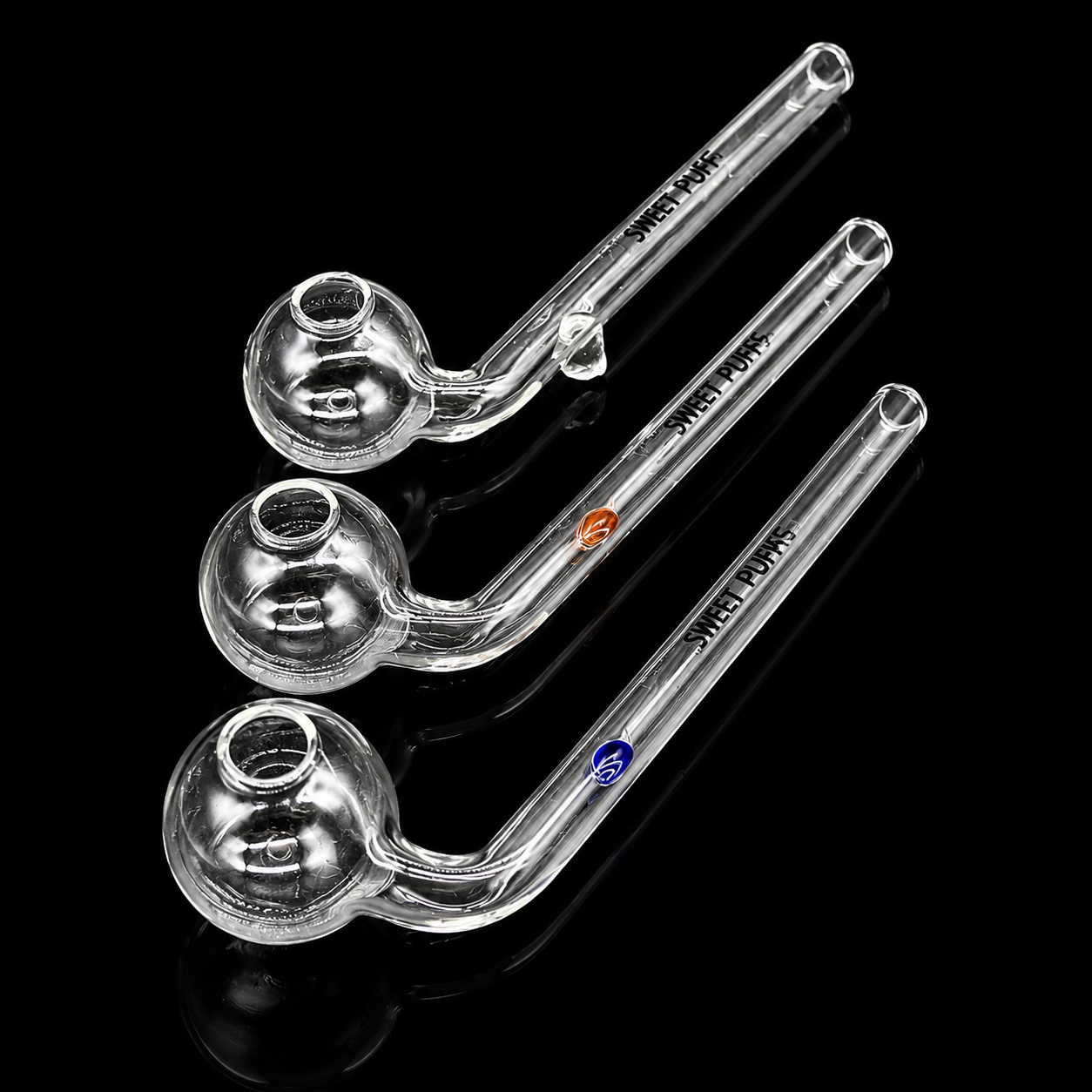 Three clear glass pipes with brand names on a black background