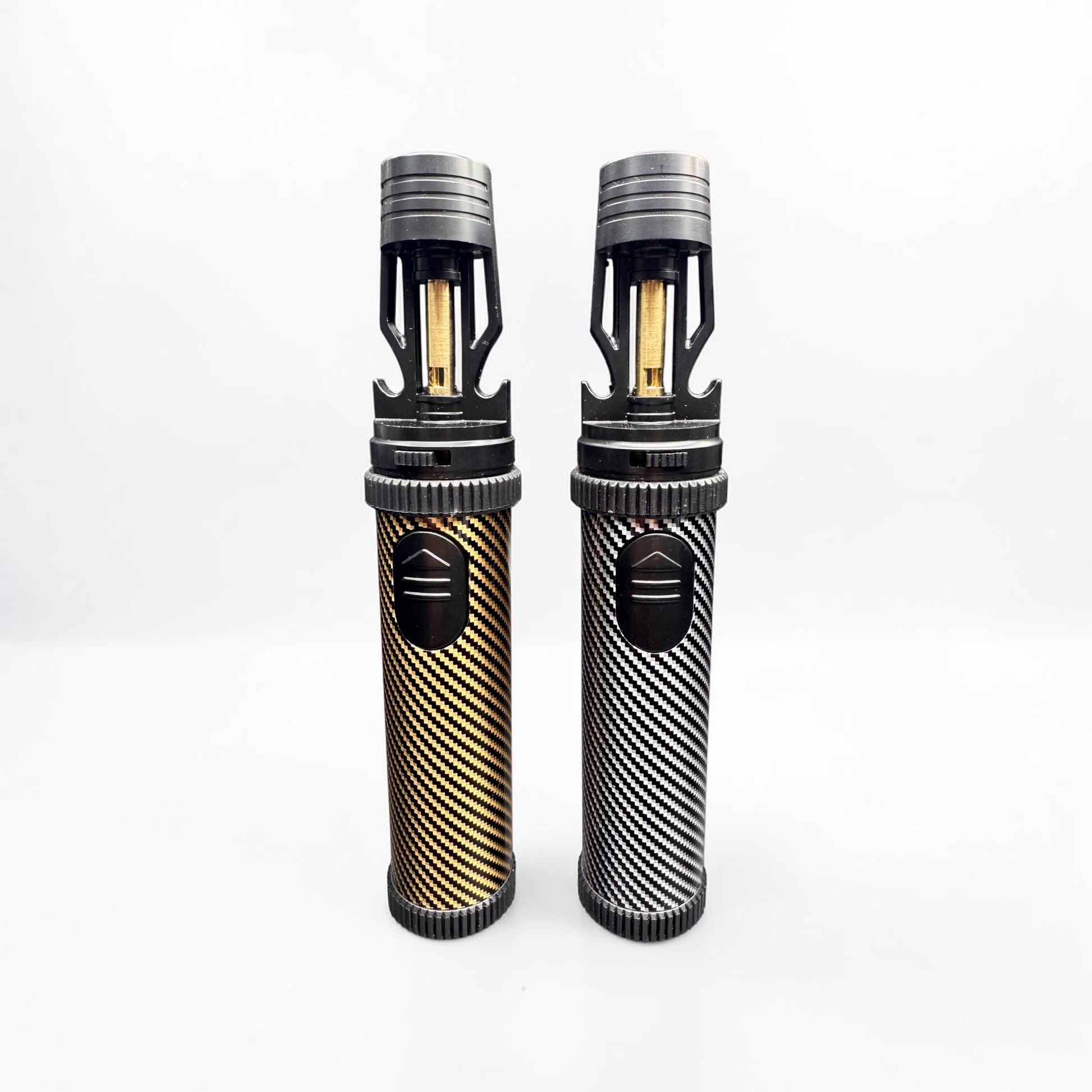Two cylindrical Torch Lighters with carbon fiber pattern on a white background