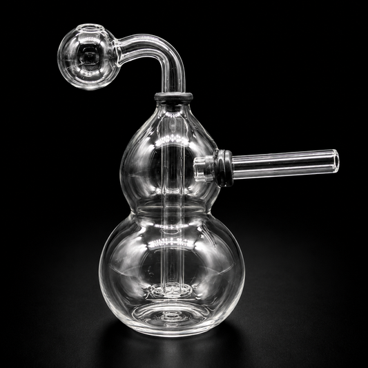 Clear glass smoking device on a black background