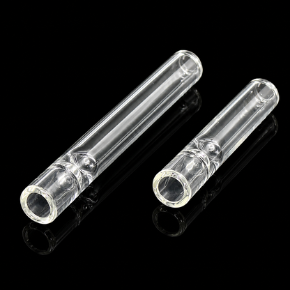 Two clear glass tubes on a black background