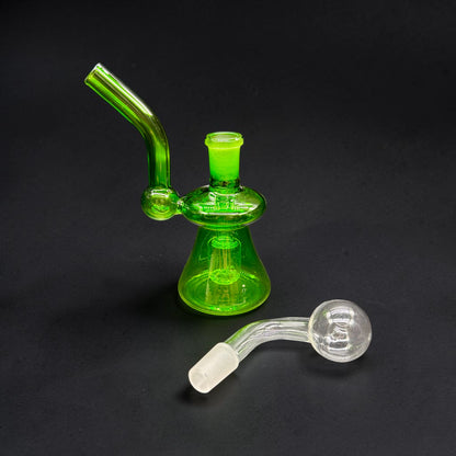 Green glass water pipe with a clear smoking accessory on a black background