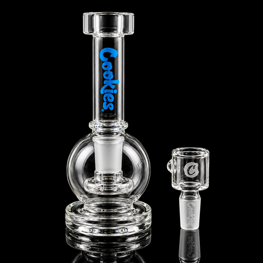 Clear glass smoking device with 'Cookies' branding on a black background