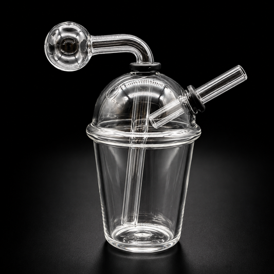 Clear glass smoking device with a handle on a black background