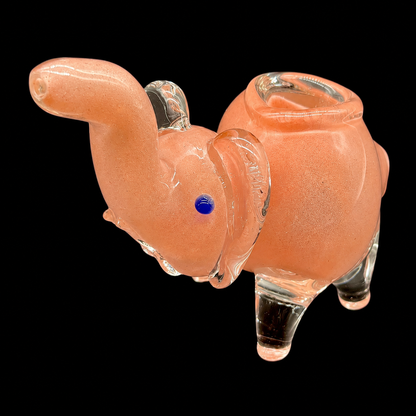 Glass smoking accessory with a blue dot on a black background