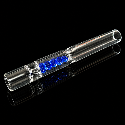 Clear glass pipe with blue beads on a black background