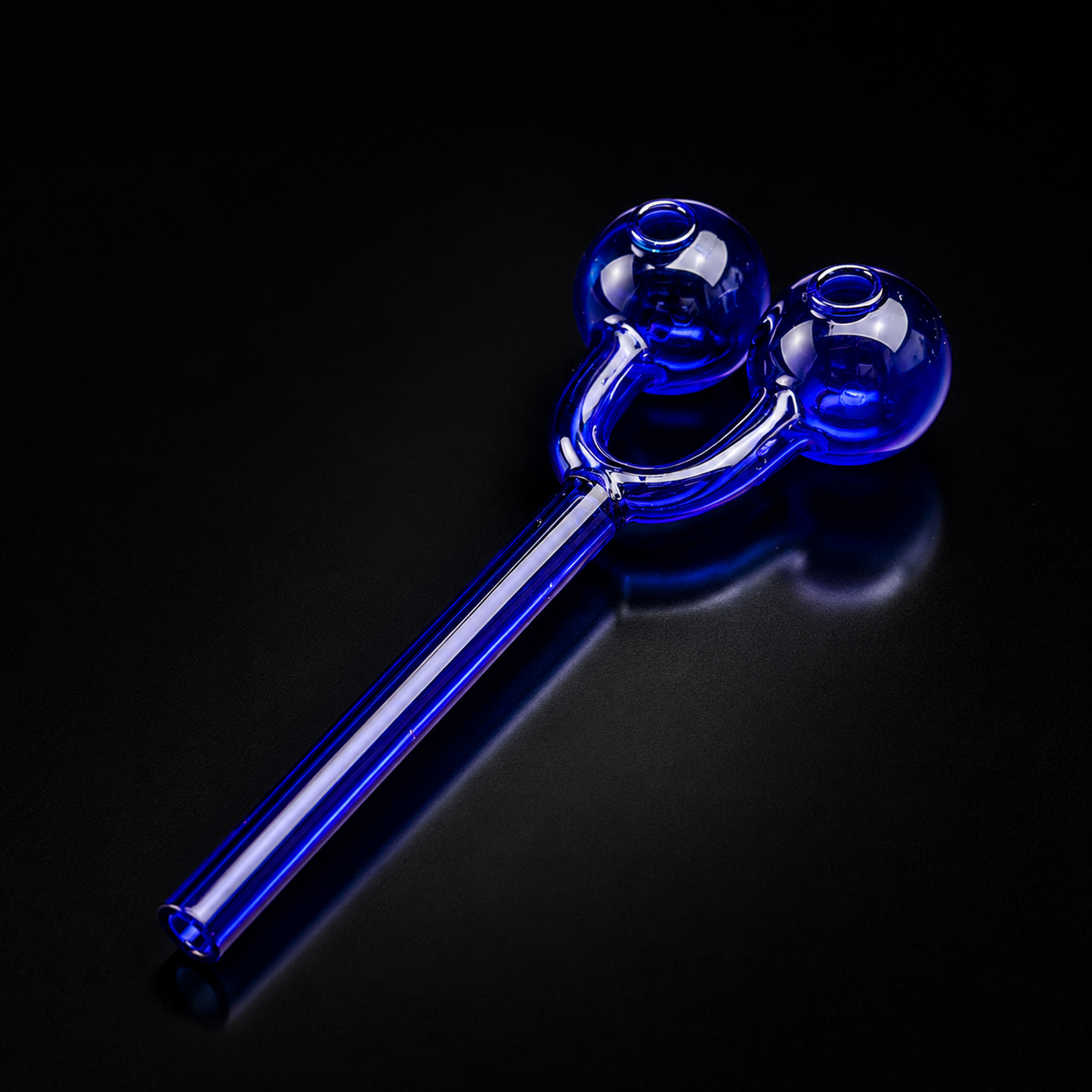 Blue glass pipe on a black background
