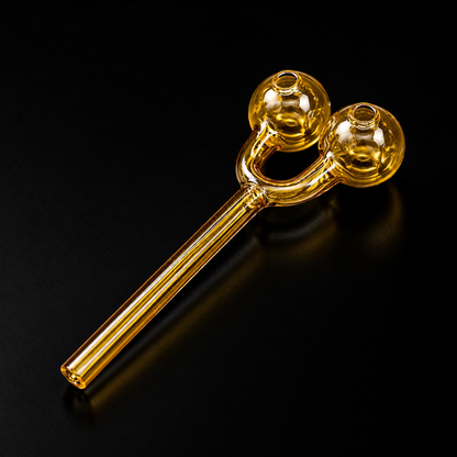 Glass smoking device with two bowls on a black background