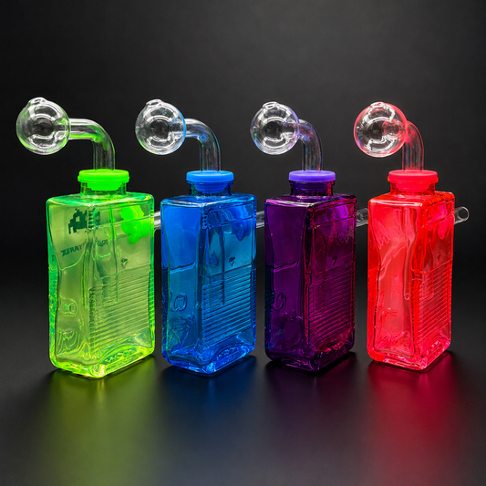 Four colorful transparent bottles with smoking accessories on a black background