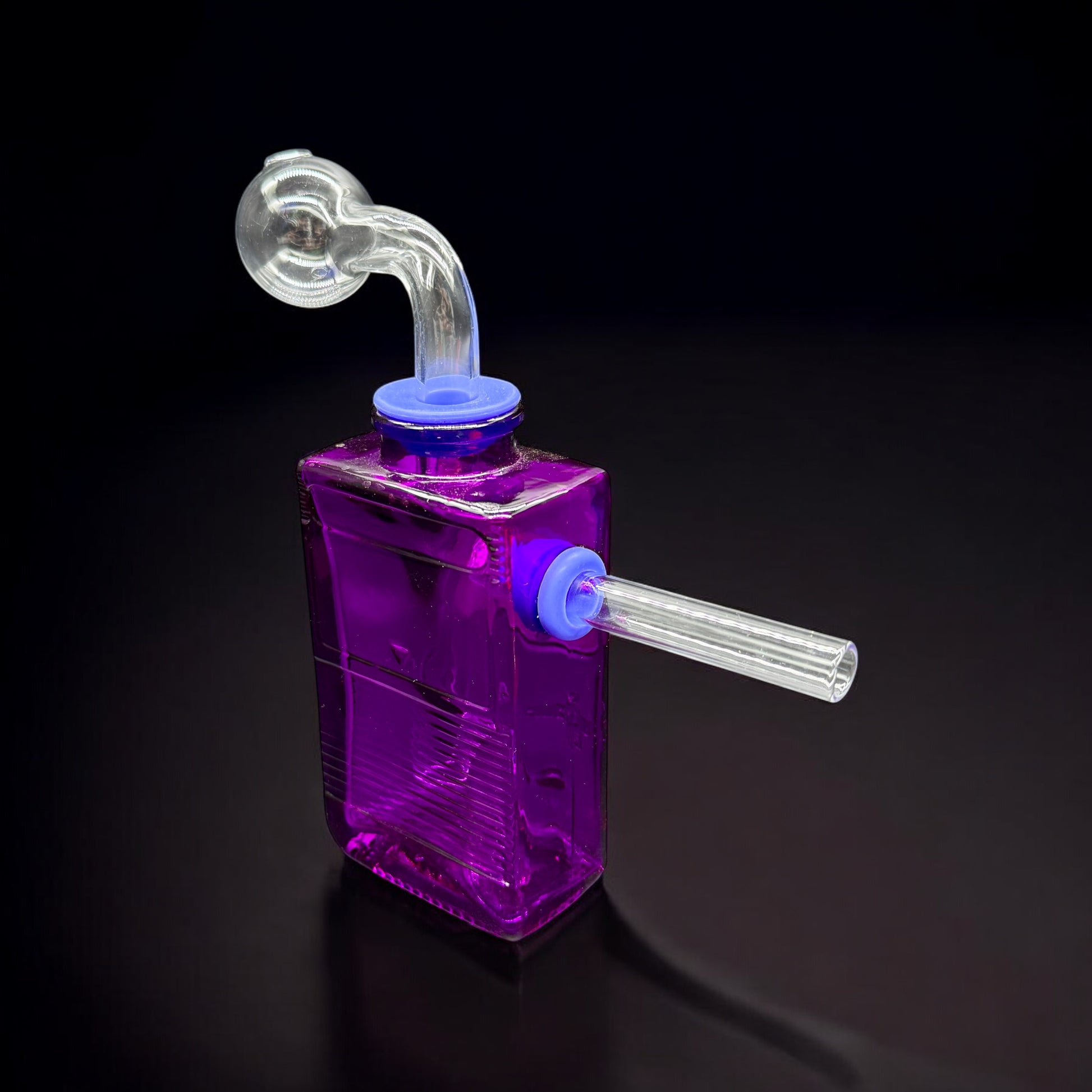 Front angled view of purple retro Gameboy bubbler pipe with removable parts and pixel design