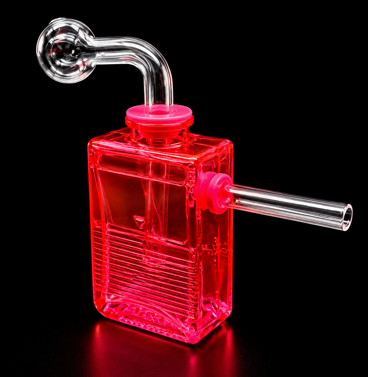Red glass water pipe with a metal straw on a black background