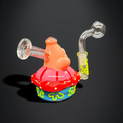 Colorful glass smoking device with a transparent hose on a black background