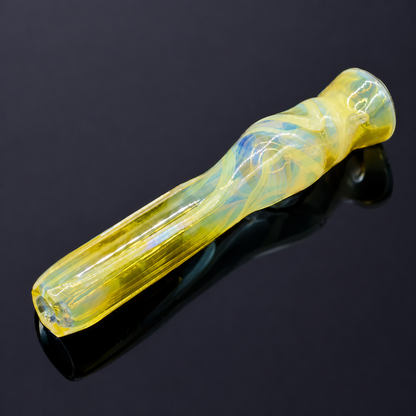 Glass pipe with a yellow and blue pattern on a black background