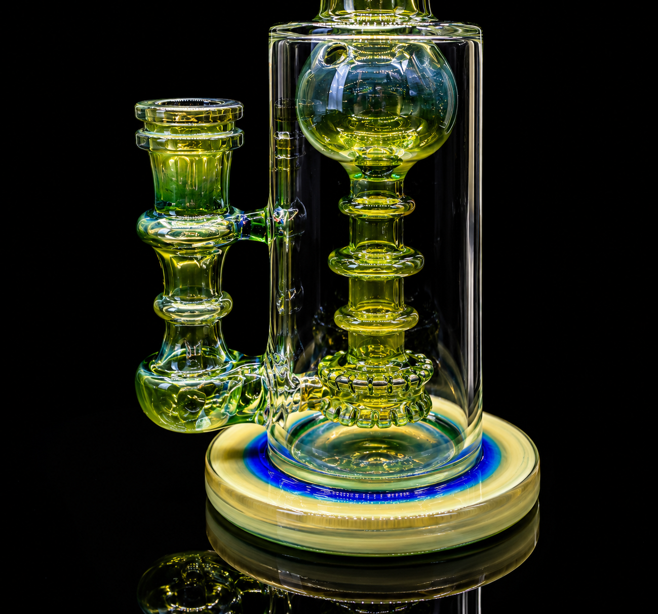 Glass smoking device with a clear base on a black background