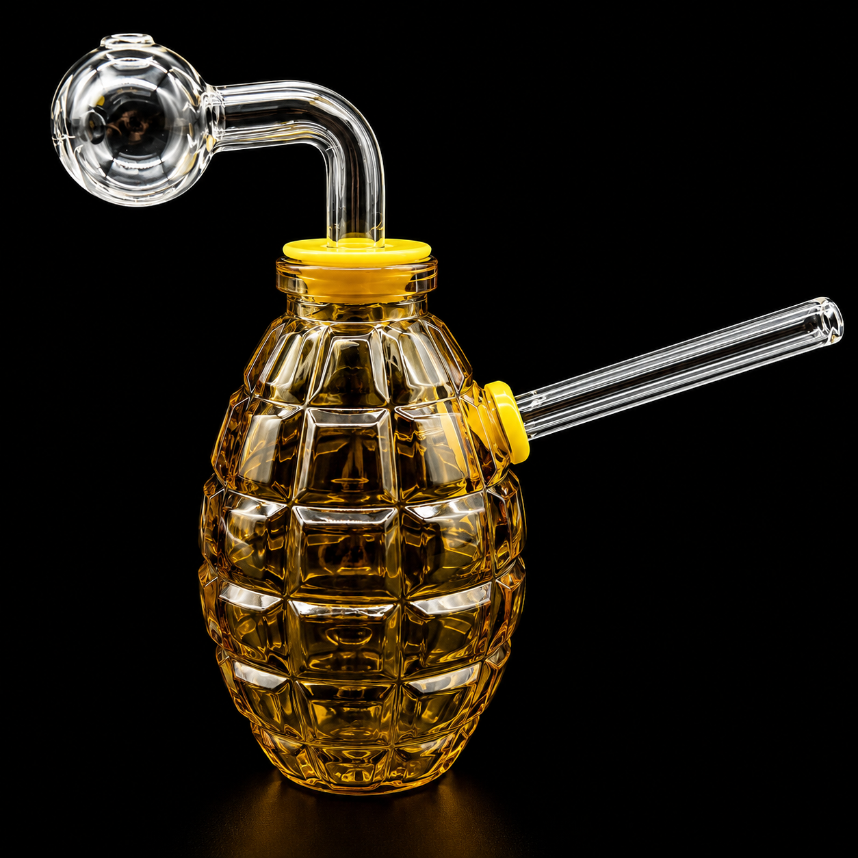 Glass smoking device with yellow cap on a black background