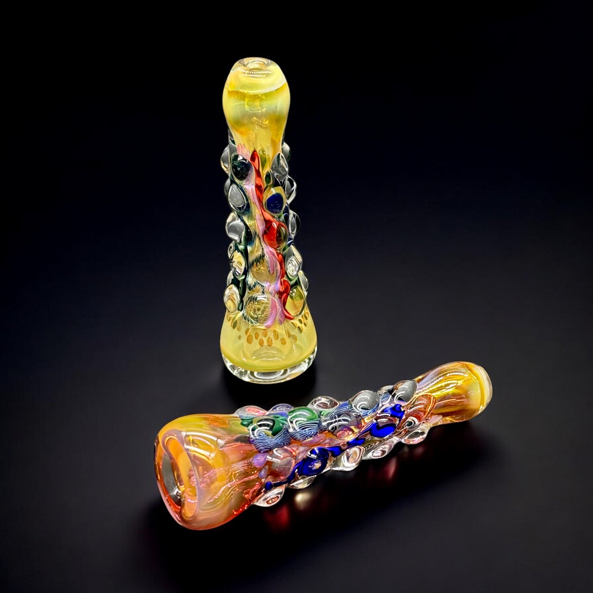 Handmade chillum glass pipe with yellow fumed finish and colorful raised dot art