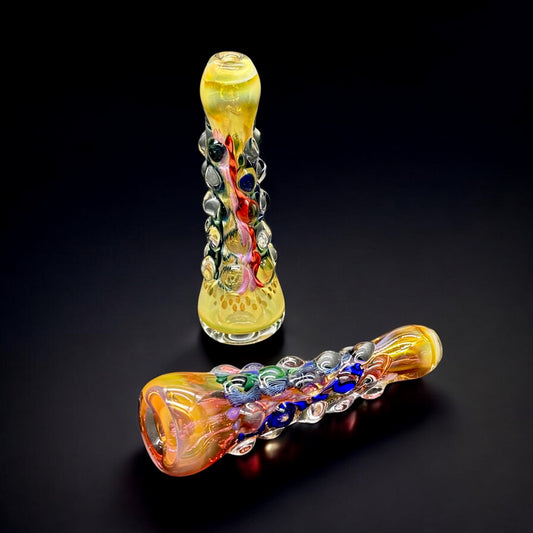 Handmade chillum glass pipe with yellow fumed finish and colorful raised dot art
