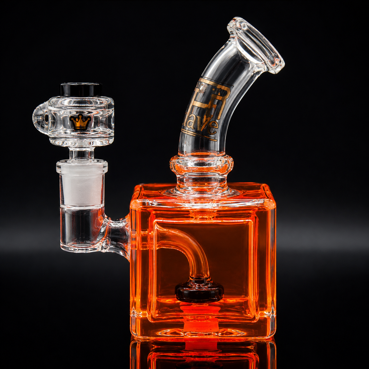 Glass smoking device with orange base and clear top on a black background