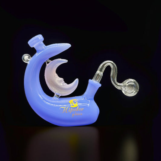 Blue glass pipe with moon design on a black background