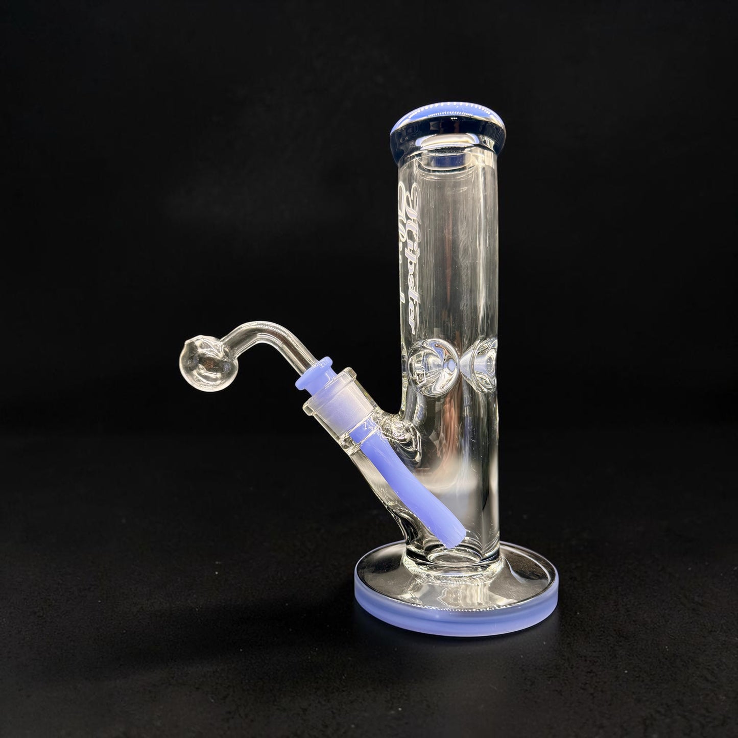 Clear glass water pipe with blue accents on a black background