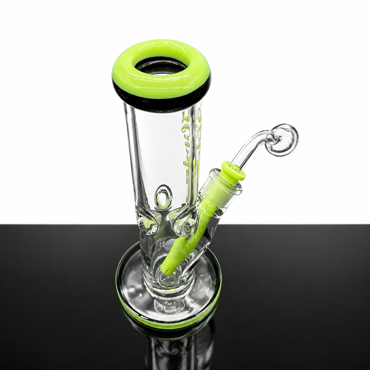 Clear glass water pipe with green accents on a black background