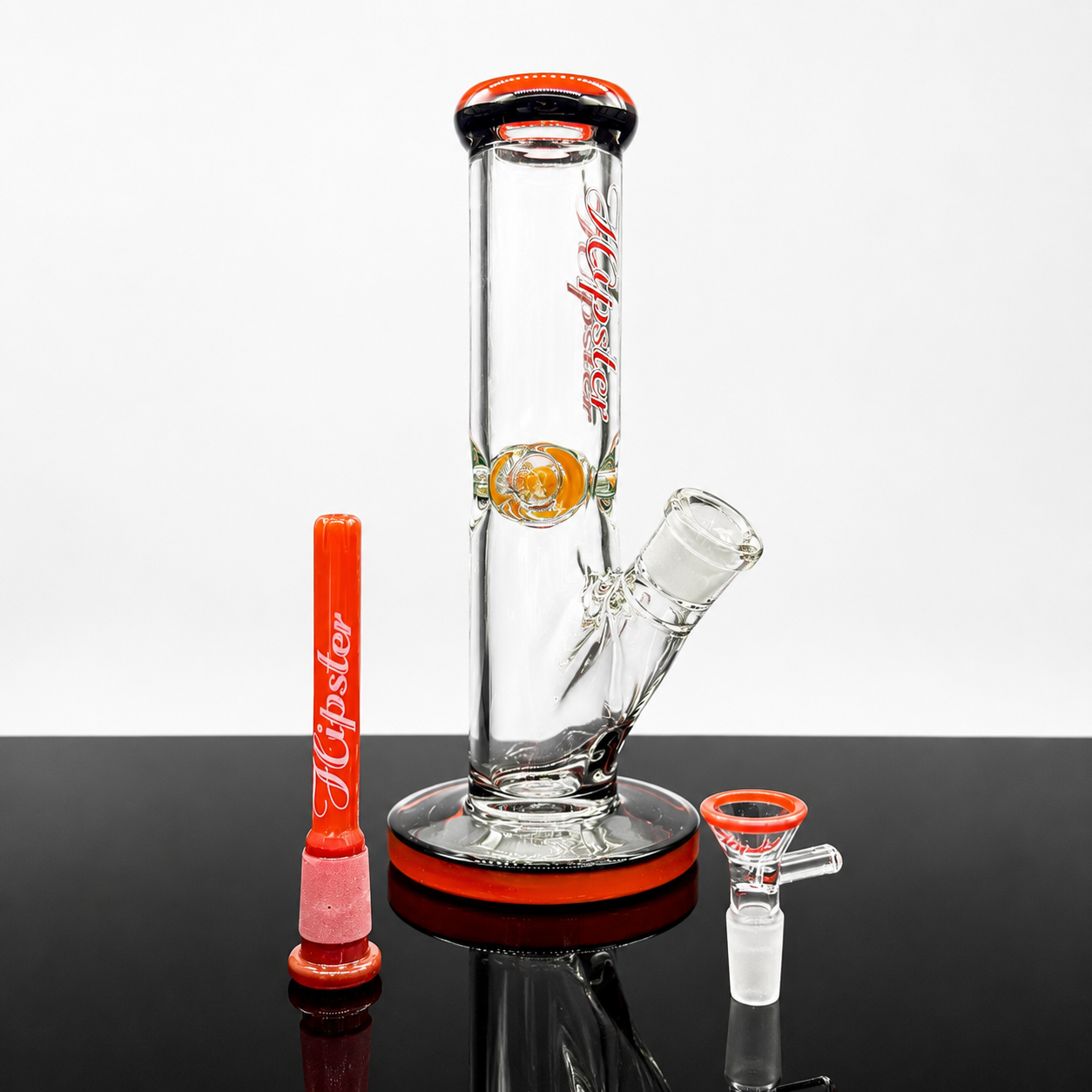 Glass smoking device with red and orange accents on a reflective surface