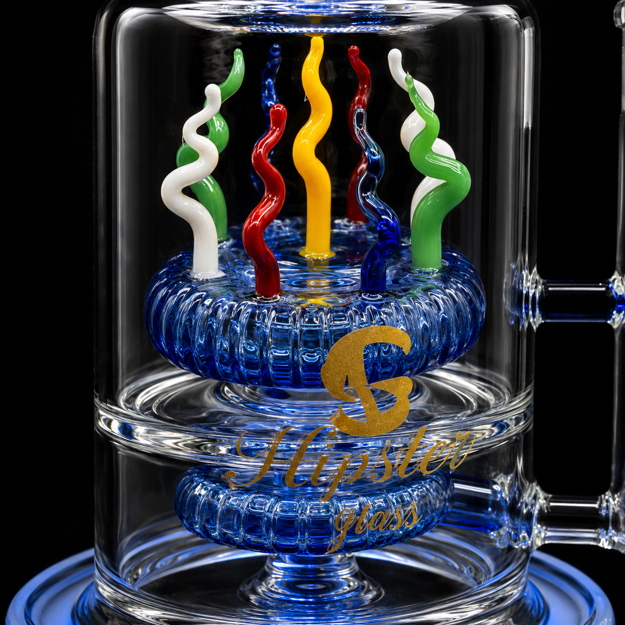 Glass smoking accessory with colorful wands inside a clear glass container, branded 'Flipster glass'.
