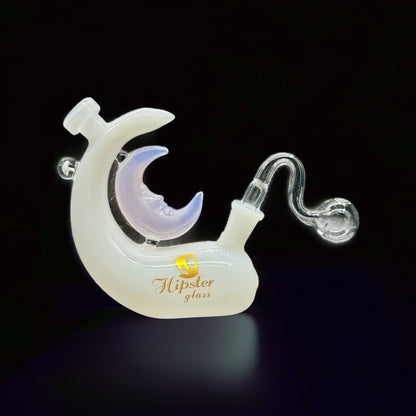 Glass smoking accessory with 'Hipster glass' branding on a black background