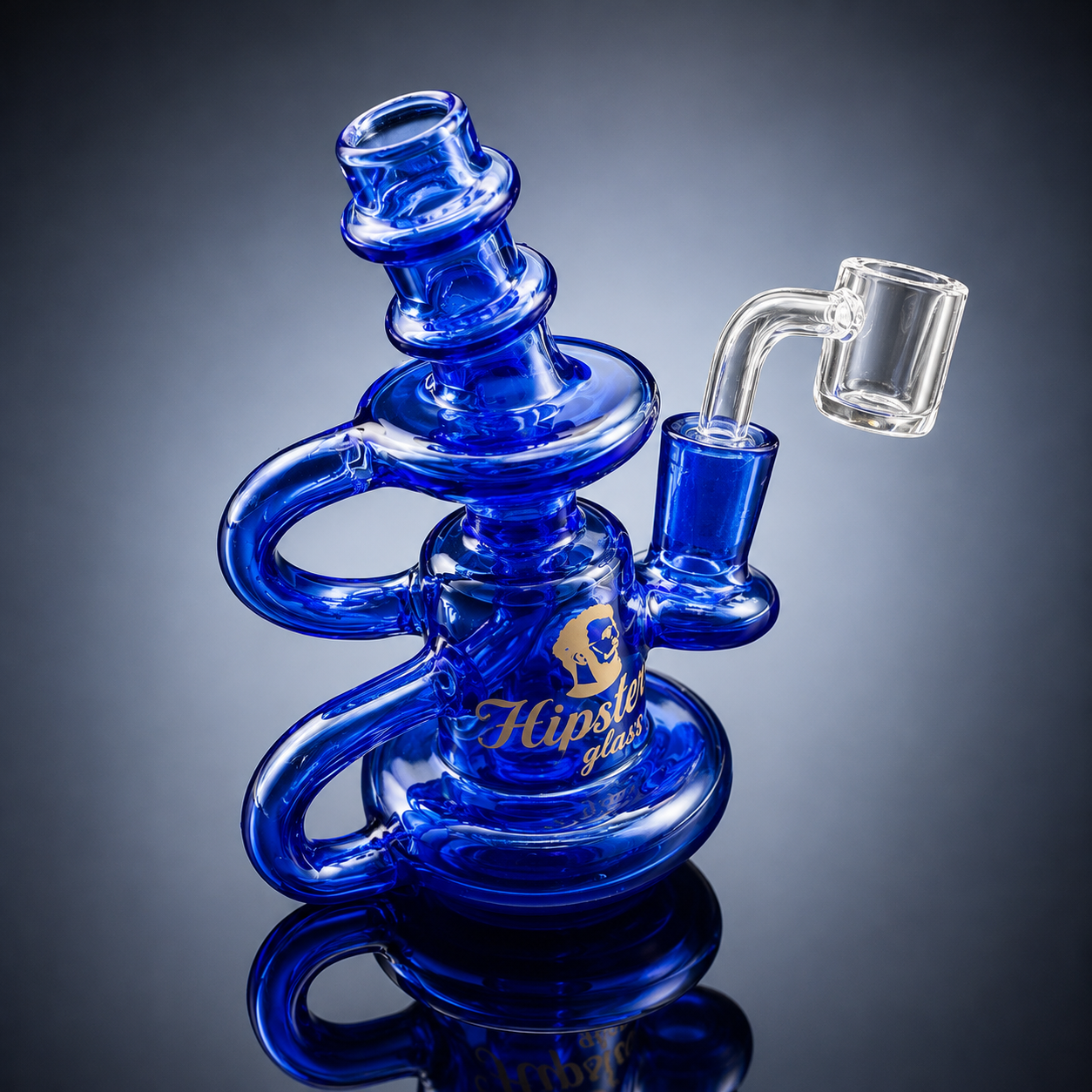 Blue glass water pipe with 'Hipsie Glass' branding on a reflective surface.