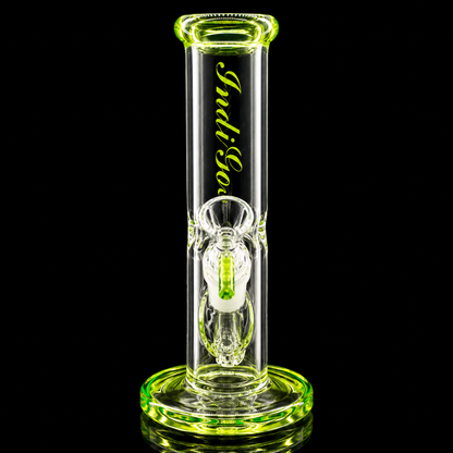 Clear glass smoking device with green accents on a black background