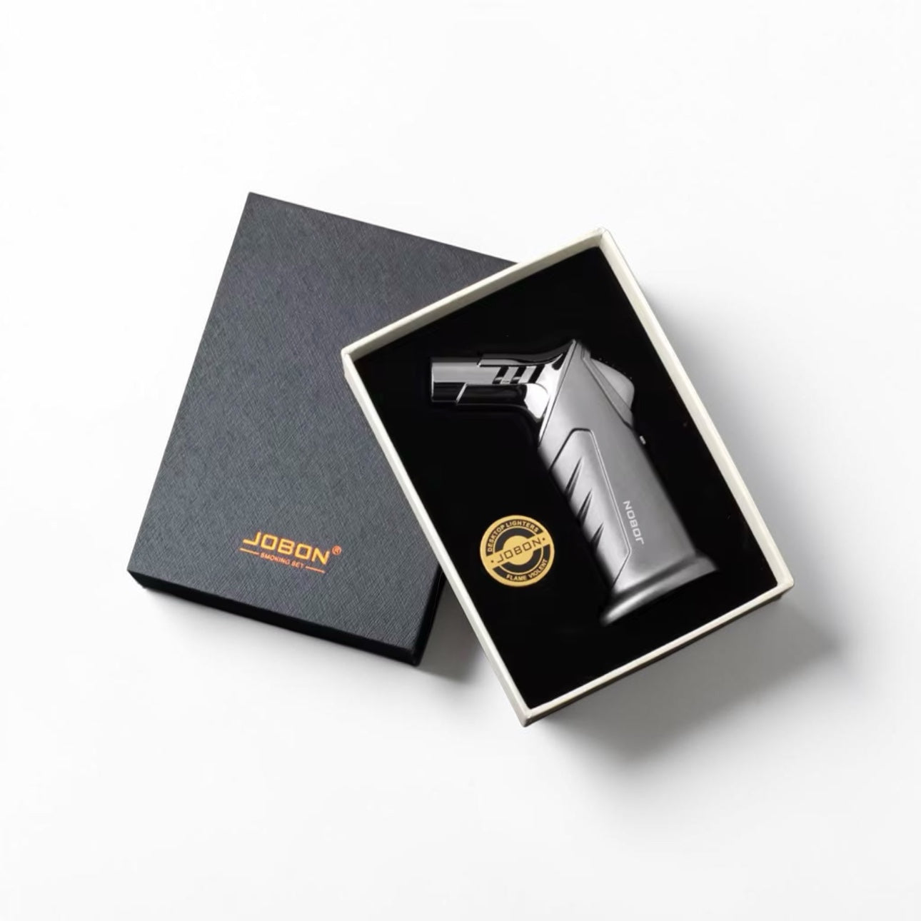 Silver electronic device in a black box with JOYBOY branding on a white background