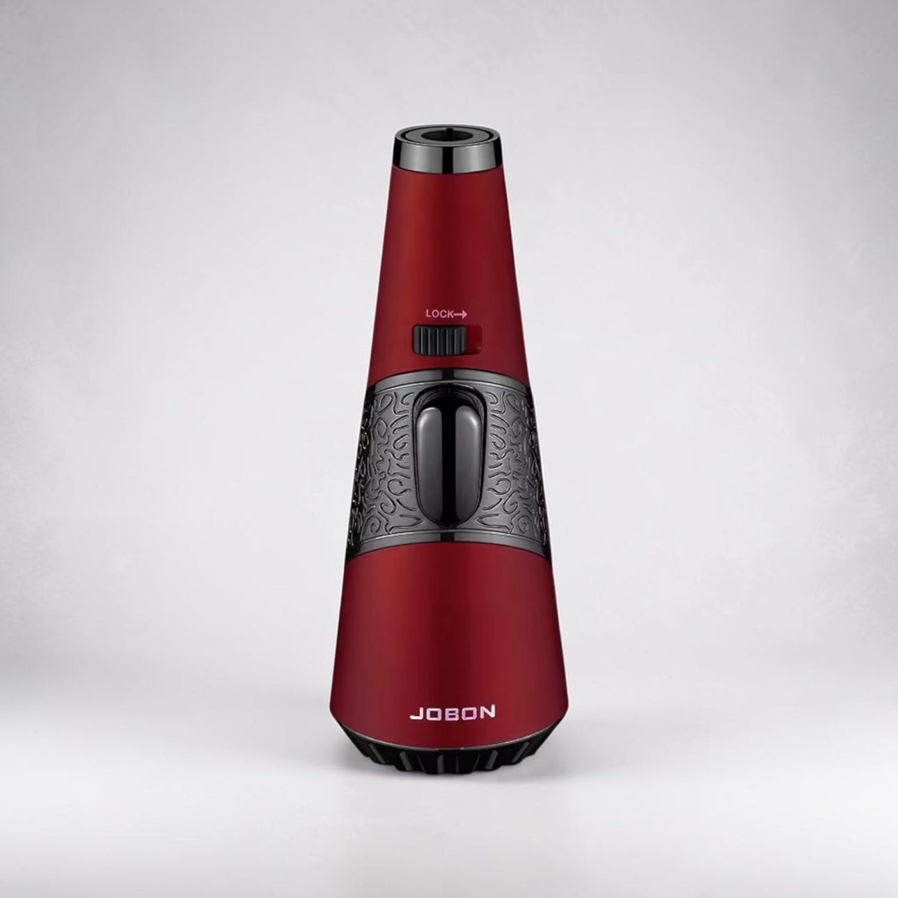 Red handheld device with black accents on a white background