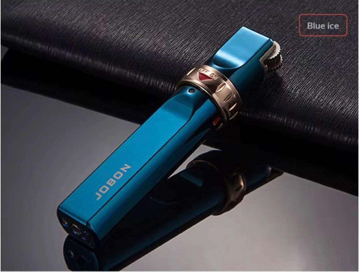 Blue lighter with gold accents on a black surface