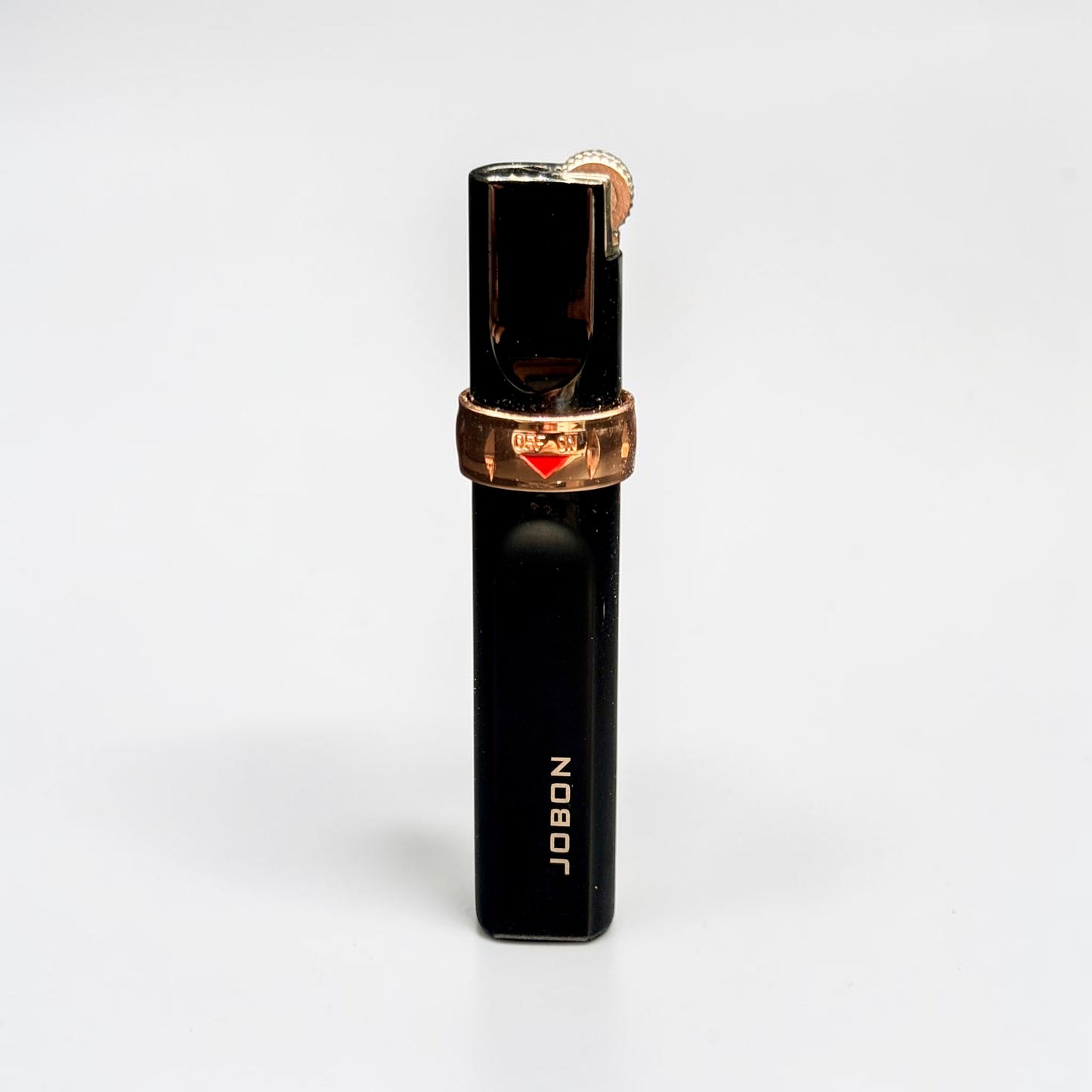 Black and rose gold lighter with 'Jubilee' branding on a white background