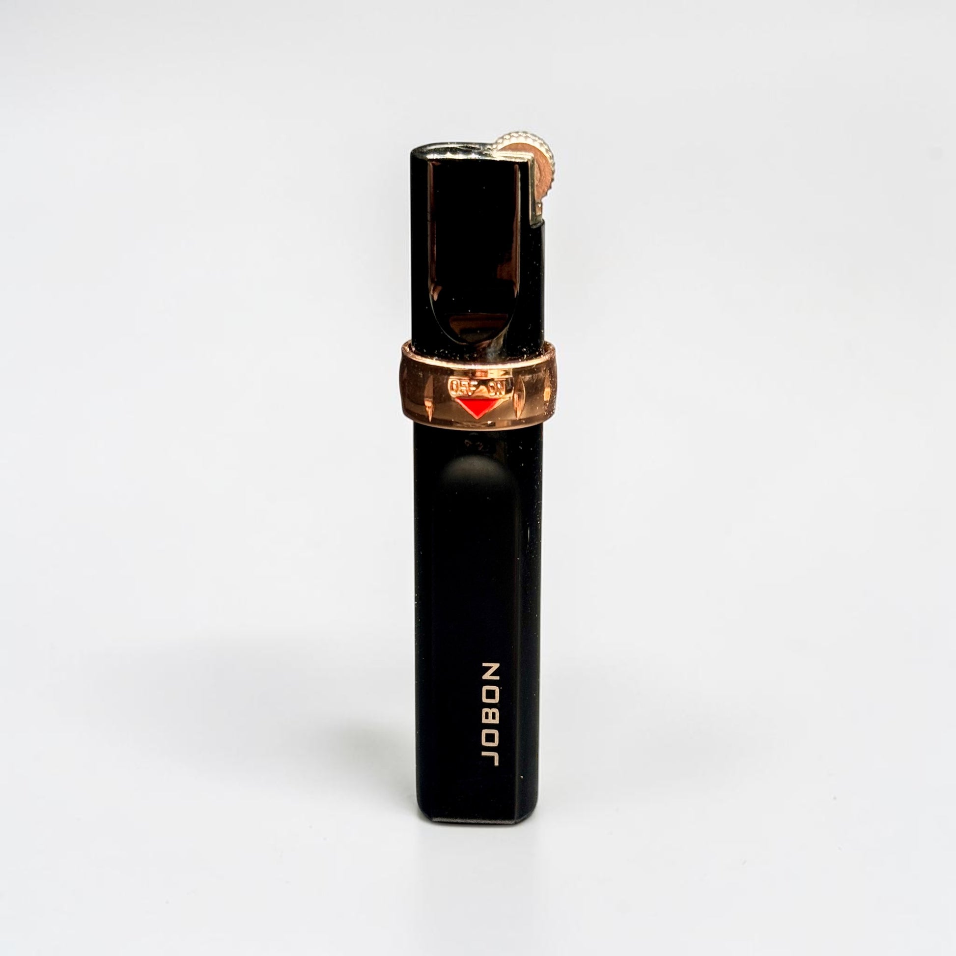 Black and rose gold lighter with 'Jubilee' branding on a white background
