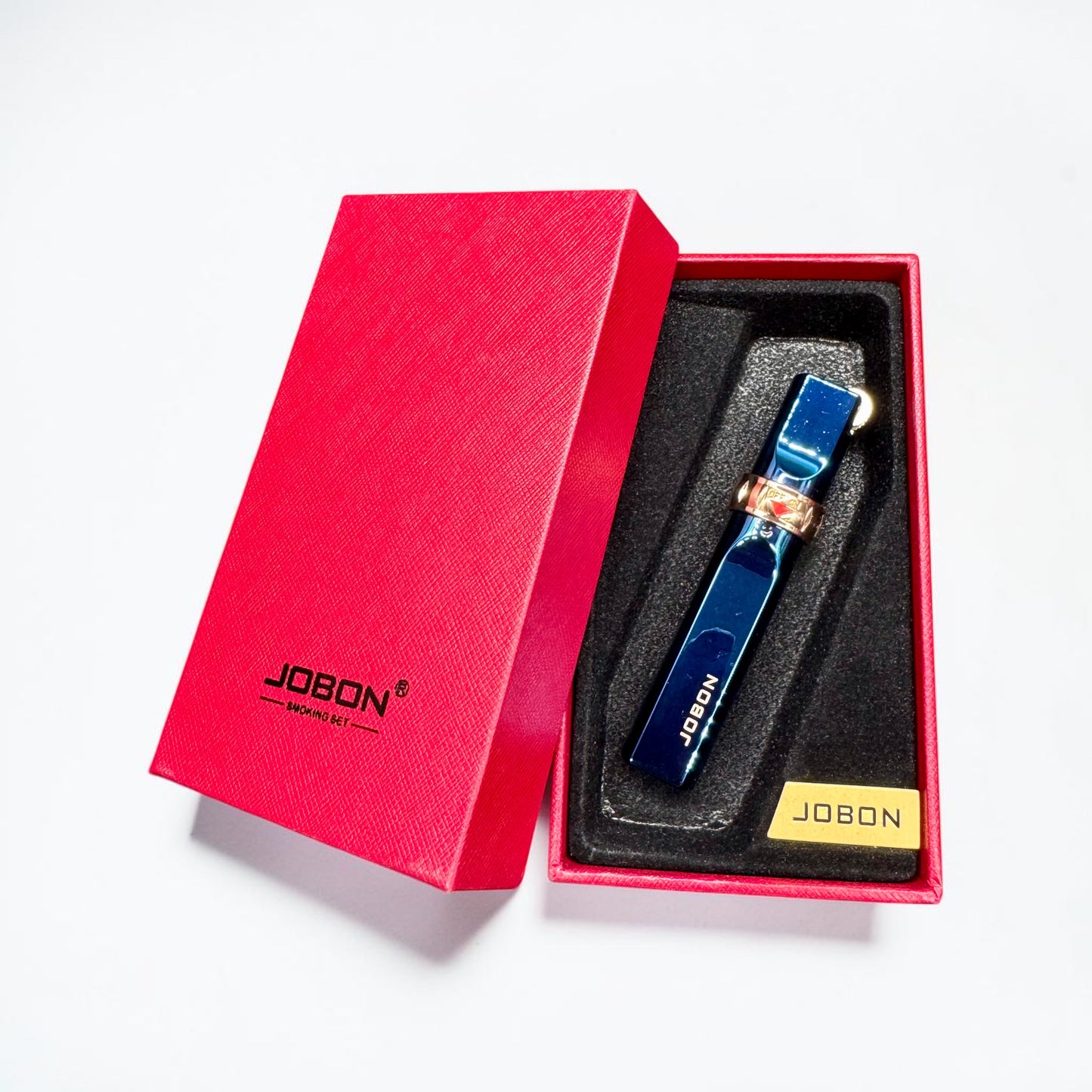 Blue lighter with gold accents in a red 'JOBON' box on a white background