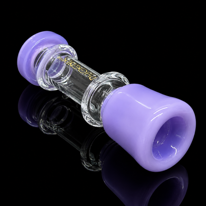 Glass smoking accessory with purple ends on a black background