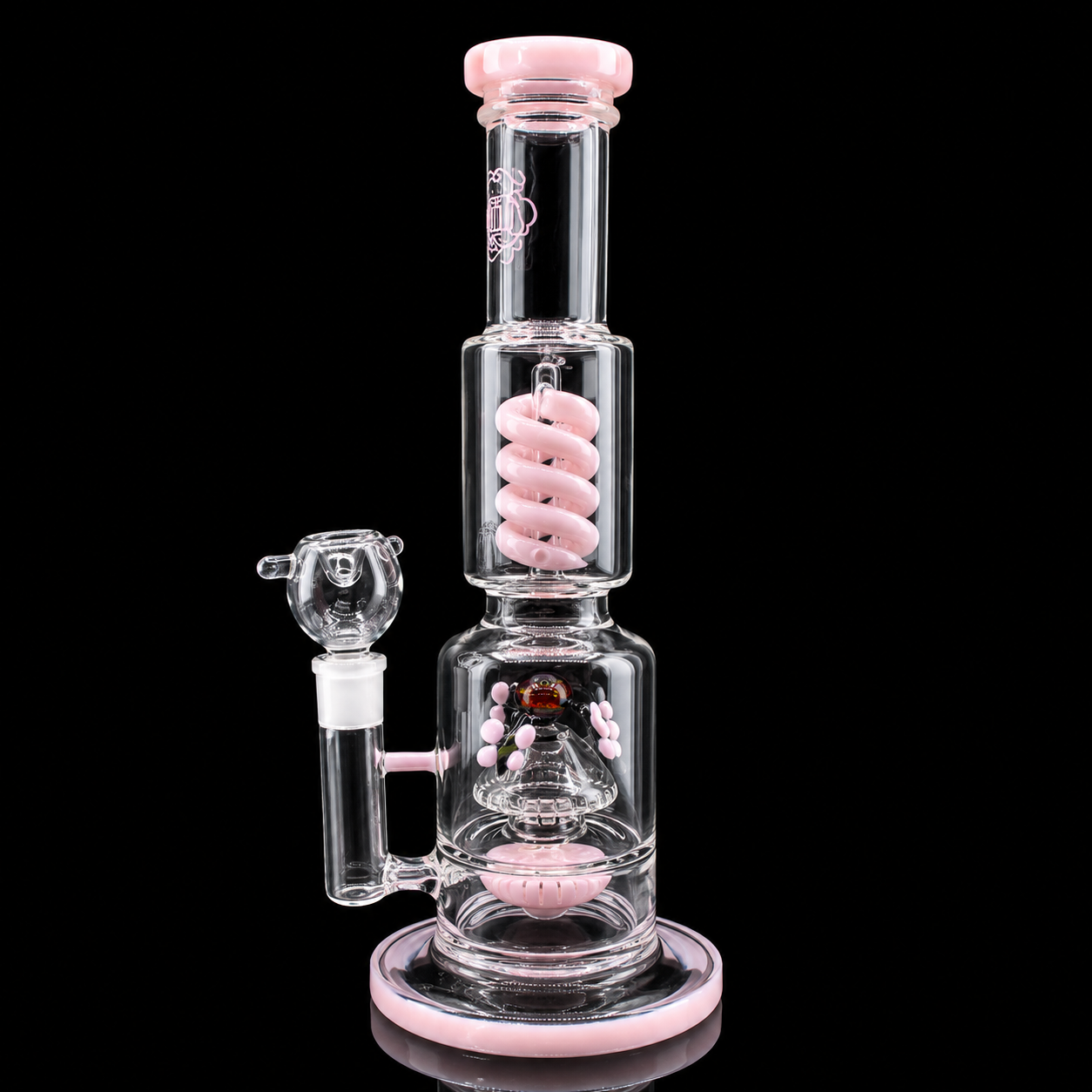 Glass smoking device with pink accents on a black background