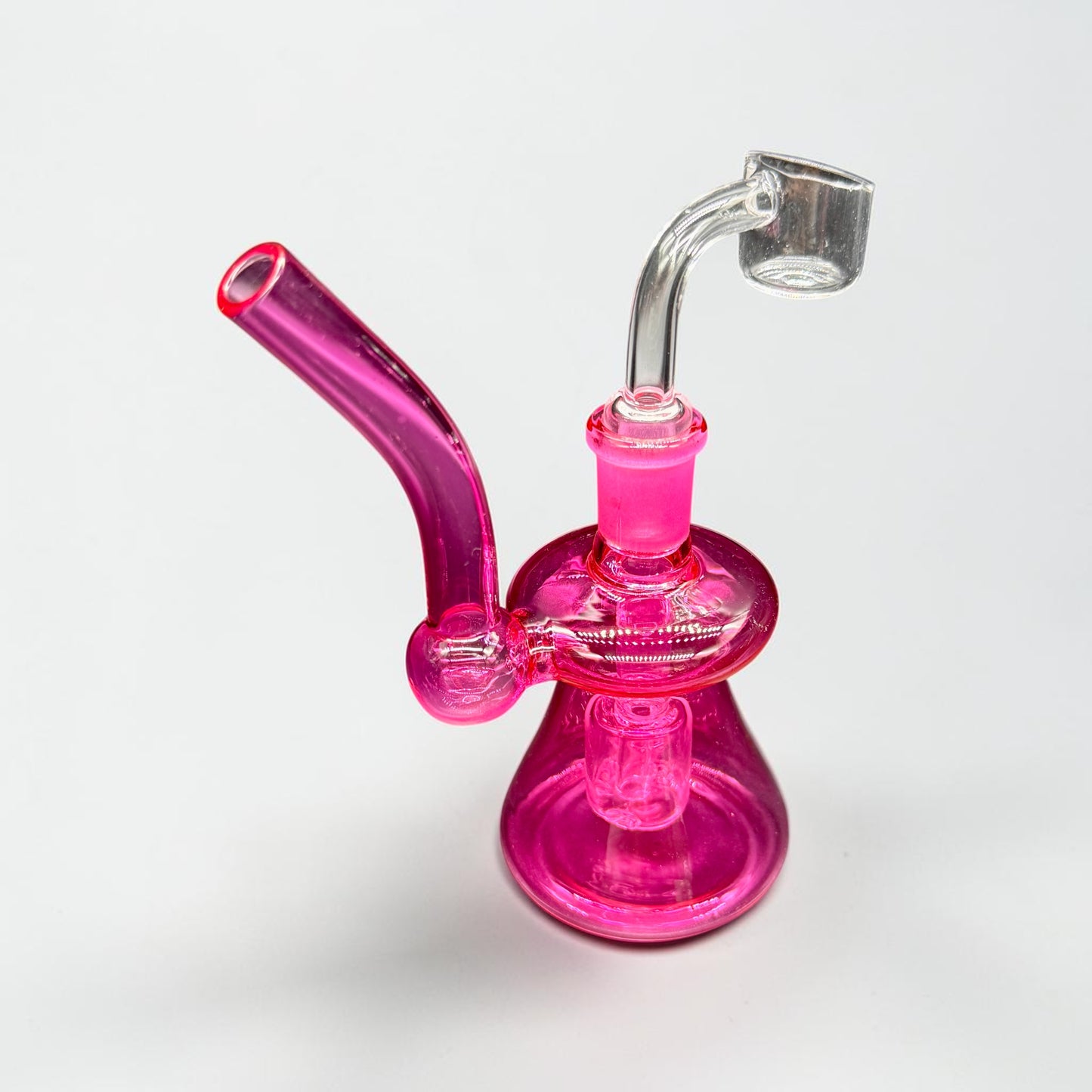 Pink glass water pipe on a white background