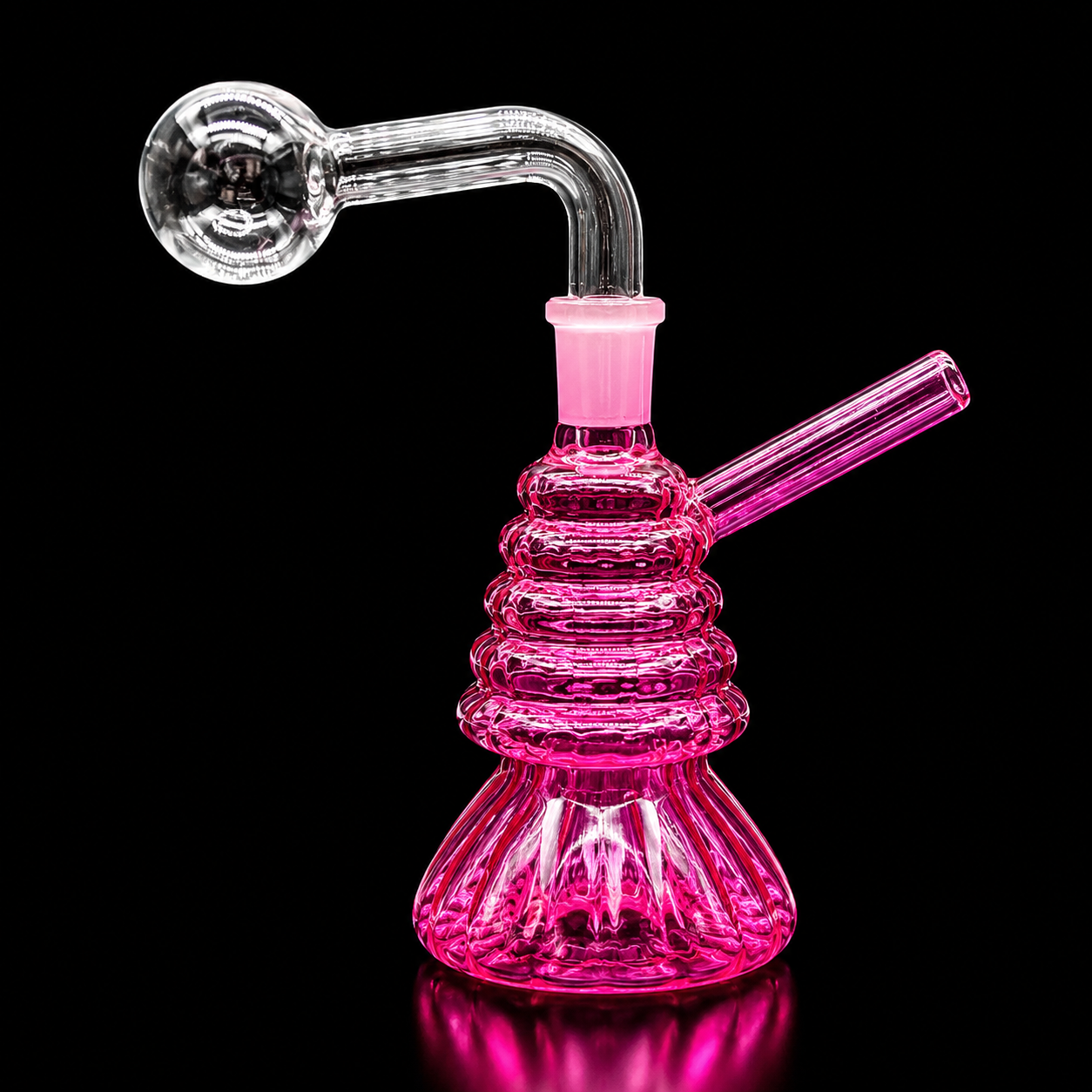 Pink glass water pipe on a black background