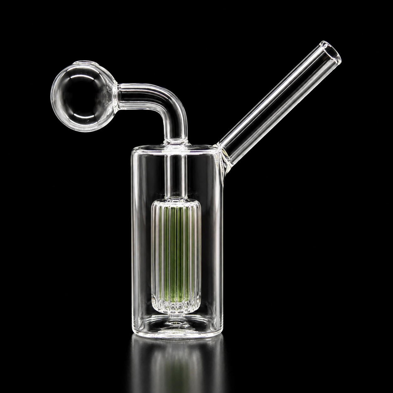 Clear glass smoking device with a green filter on a black background
