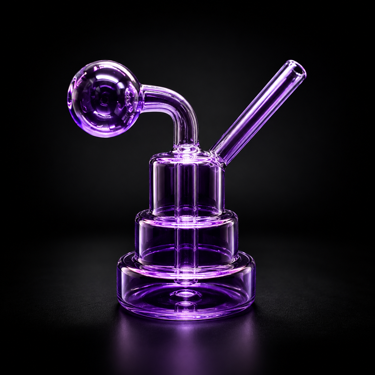 Purple glass smoking device on a black background