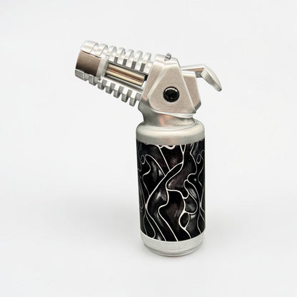 Butane lighter with artistic design on a white background
