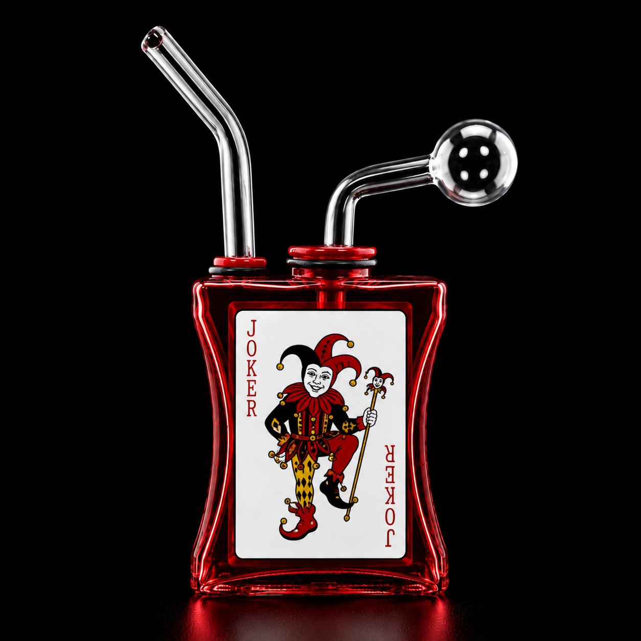Glass smoking device with a joker card design on a black background
